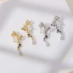 Серьги-гвоздики с бантом и сердцем, эмаль и цирконий, позолота 14K