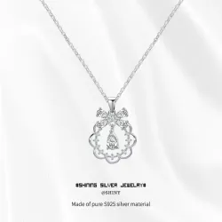 Колье из серебра 925 пробы с подвеской-бантом и каплей